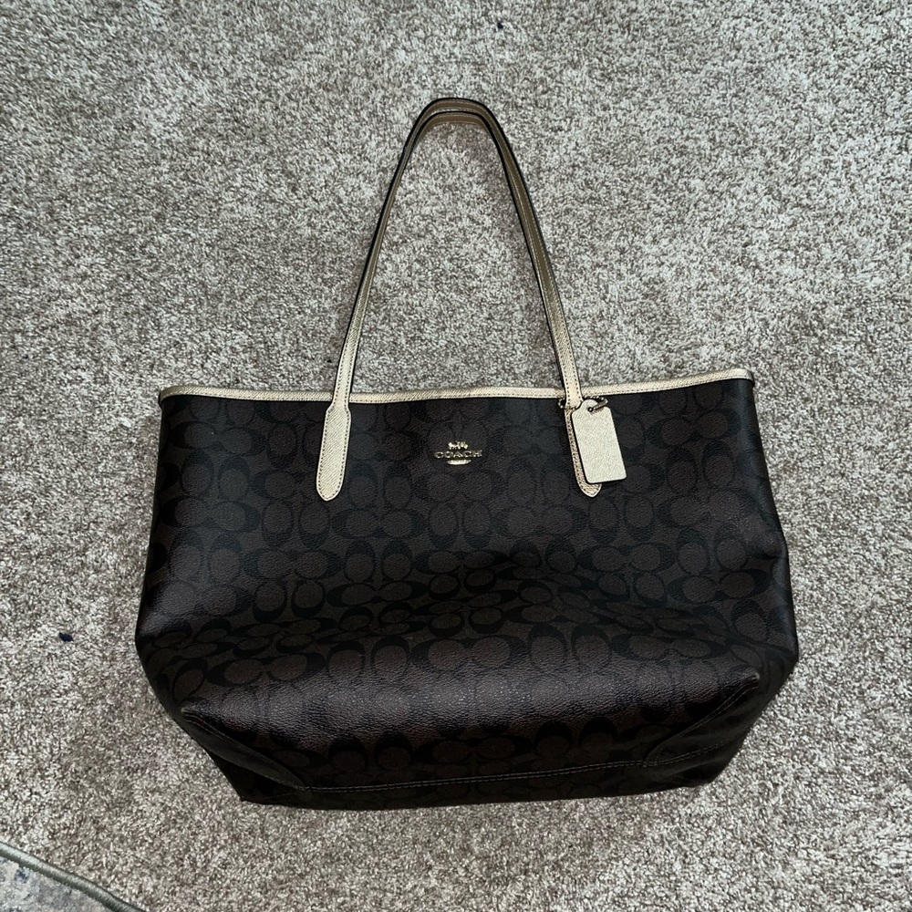 Coach Purse tote chocolate brown and gold/cream shimmery straps.